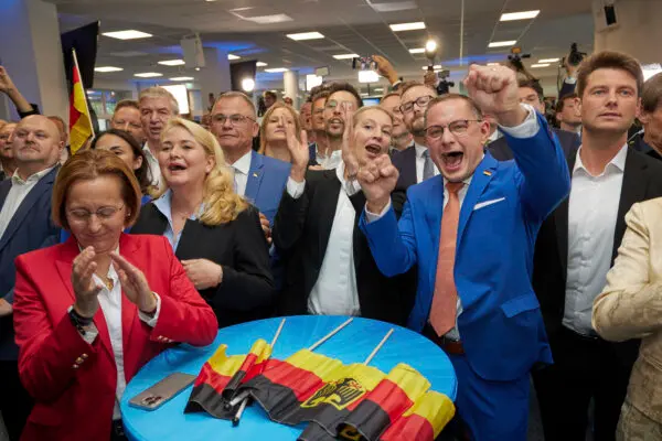 Alice Weidel (C) and Tino Chrupalla (center R), both AfD federal chairmen, cheer at the AfD party headquarters during the forecast for the European elections, in Berlin on June 9, 2024. (Joerg Carstensen/dpa via AP) Alice Weidel (C) and Tino Chrupalla (center R), both AfD federal chairmen, cheer at the AfD party headquarters during the forecast for the European elections, in Berlin on June 9, 2024. (Joerg Carstensen/dpa via AP)
