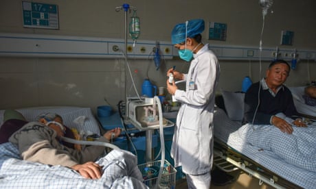 Covid patients fill a hospital ward in Fuyang, China, earlier this month.